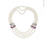 A cultured pearl, ruby and diamond necklace