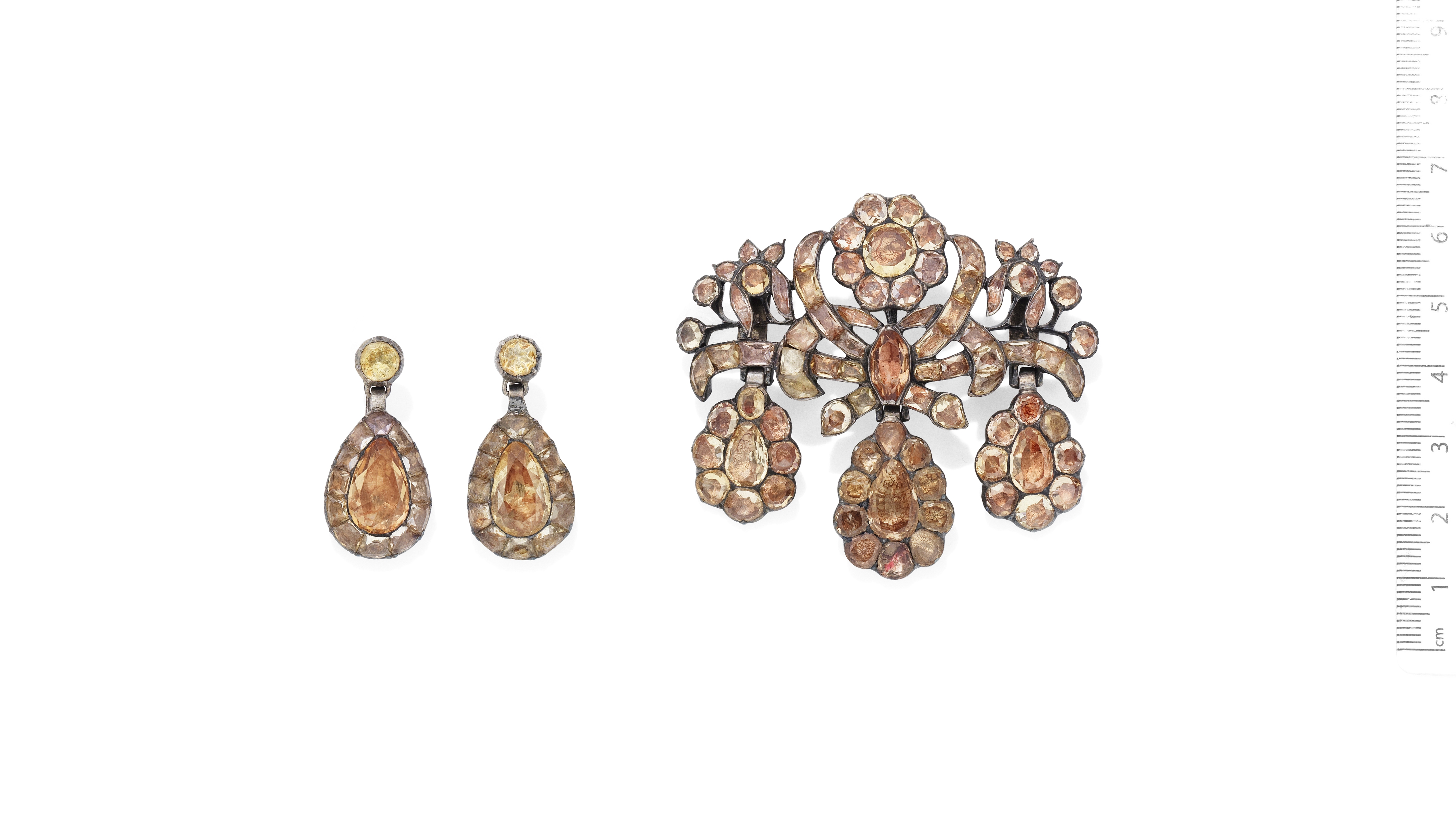 An 18th century topaz girandole brooch and a pair of topaz earrings