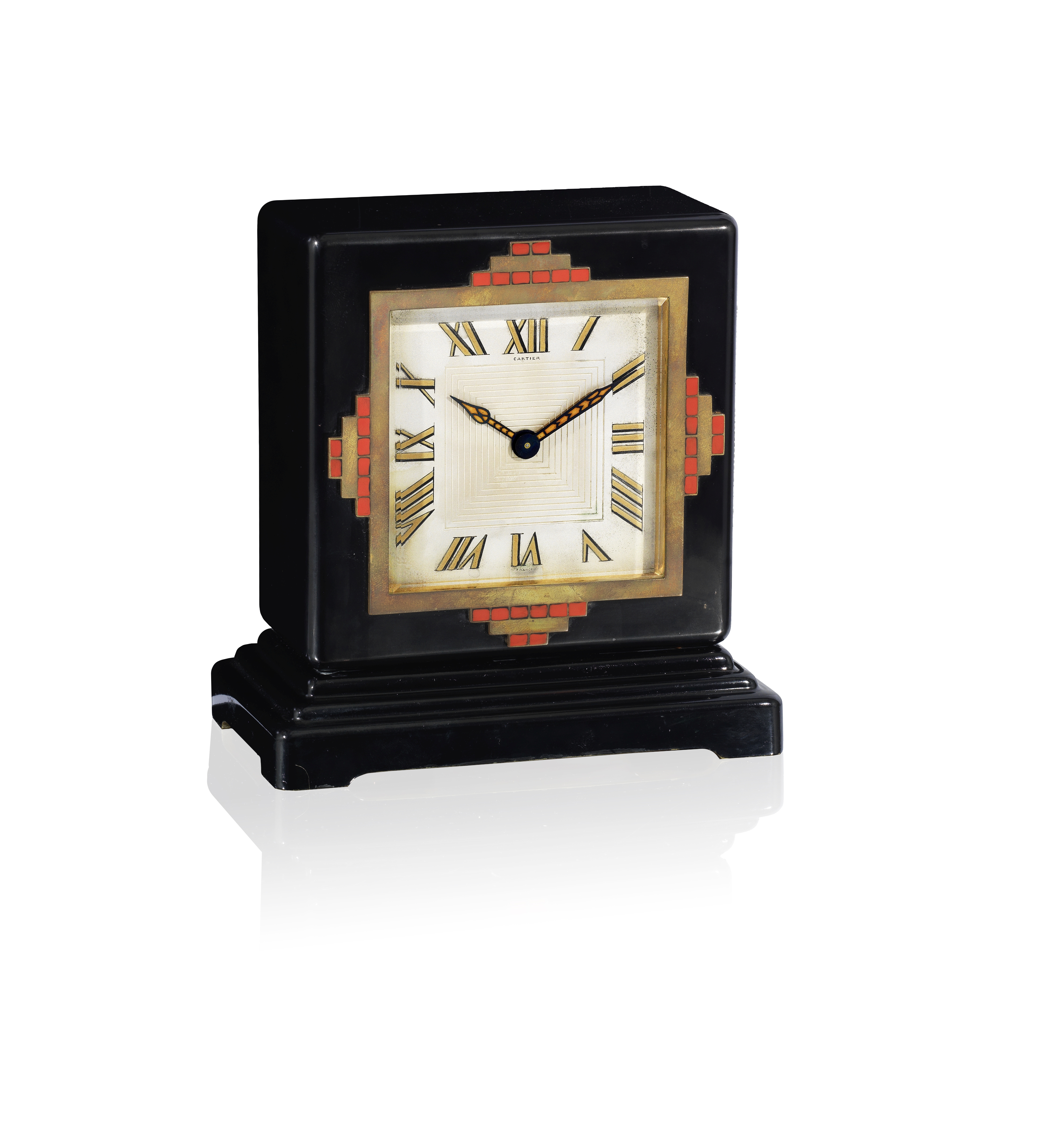 An art deco lacquer and enamel desk clock, by Cartier,