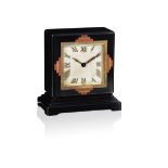 An art deco lacquer and enamel desk clock, by Cartier,