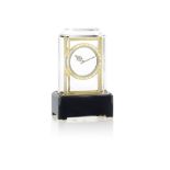 An art deco rock crystal, gold, agate, enamel and diamond-set 'Mystery Clock', by Cartier,