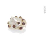 A ruby-set 'super shell' brooch, by Grima,