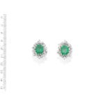 A pair of emerald and diamond earrings