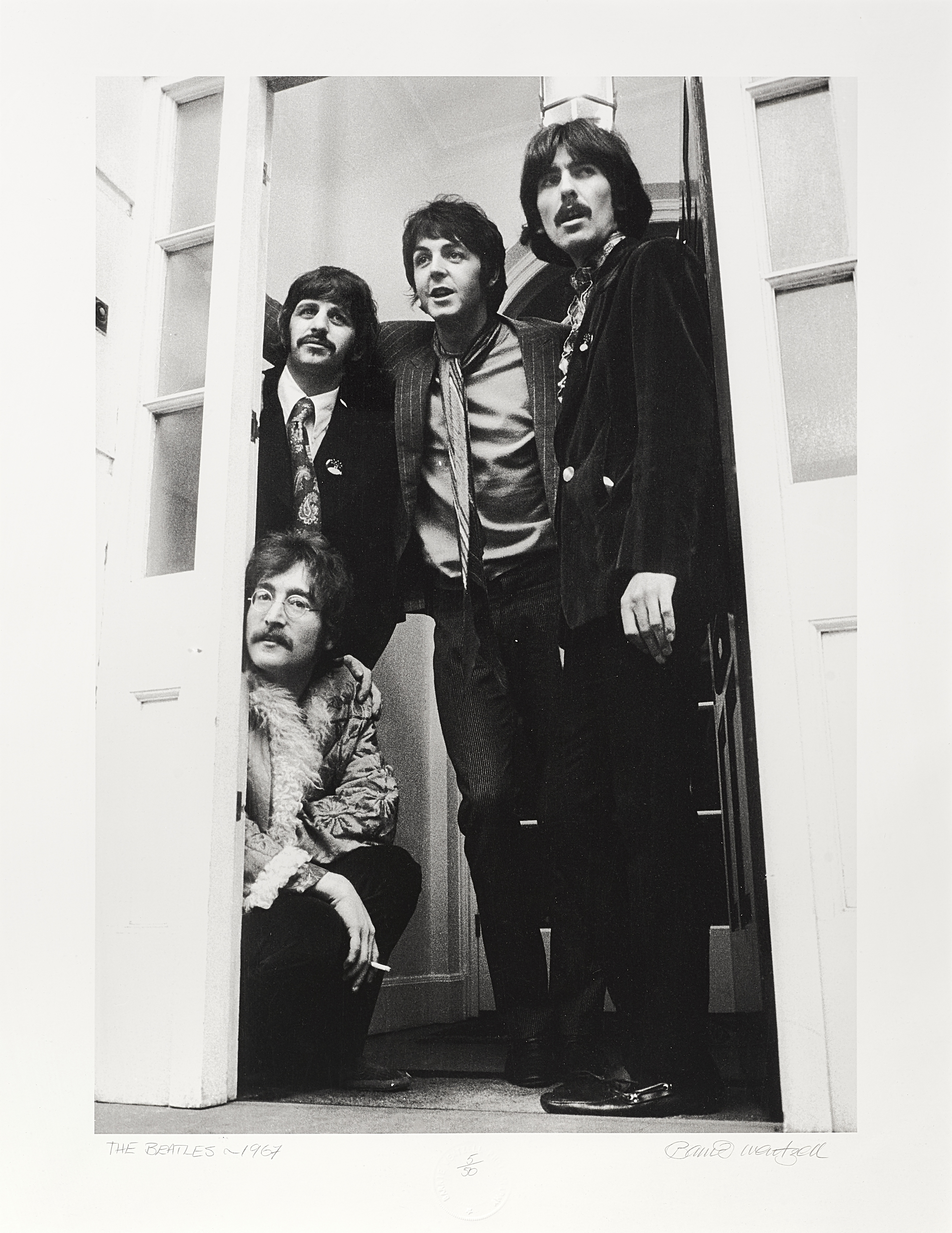 A Limited Edition Photograph Of The Beatles In A Doorway By Barrie Wentzell (British, born 1942) ...