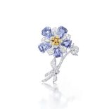 A sapphire and diamond flower brooch, Peacock