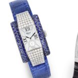 Chopard. A lady's 18K white gold, sapphire and diamond set quartz rectangular wristwatch La Stra...