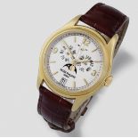 Patek Philippe. A Fine 18K gold automatic annual calendar bracelet watch with moon phase Ref: 514...