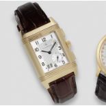 Jaeger-LeCoultre. A fine 18K rose gold manual wind reversible dual time zone calendar wristwatch ...