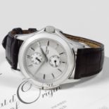 Patek Philippe. A fine platinum manual wind dual time wristwatch Travel Time, Ref: 5134P, Sold 20...