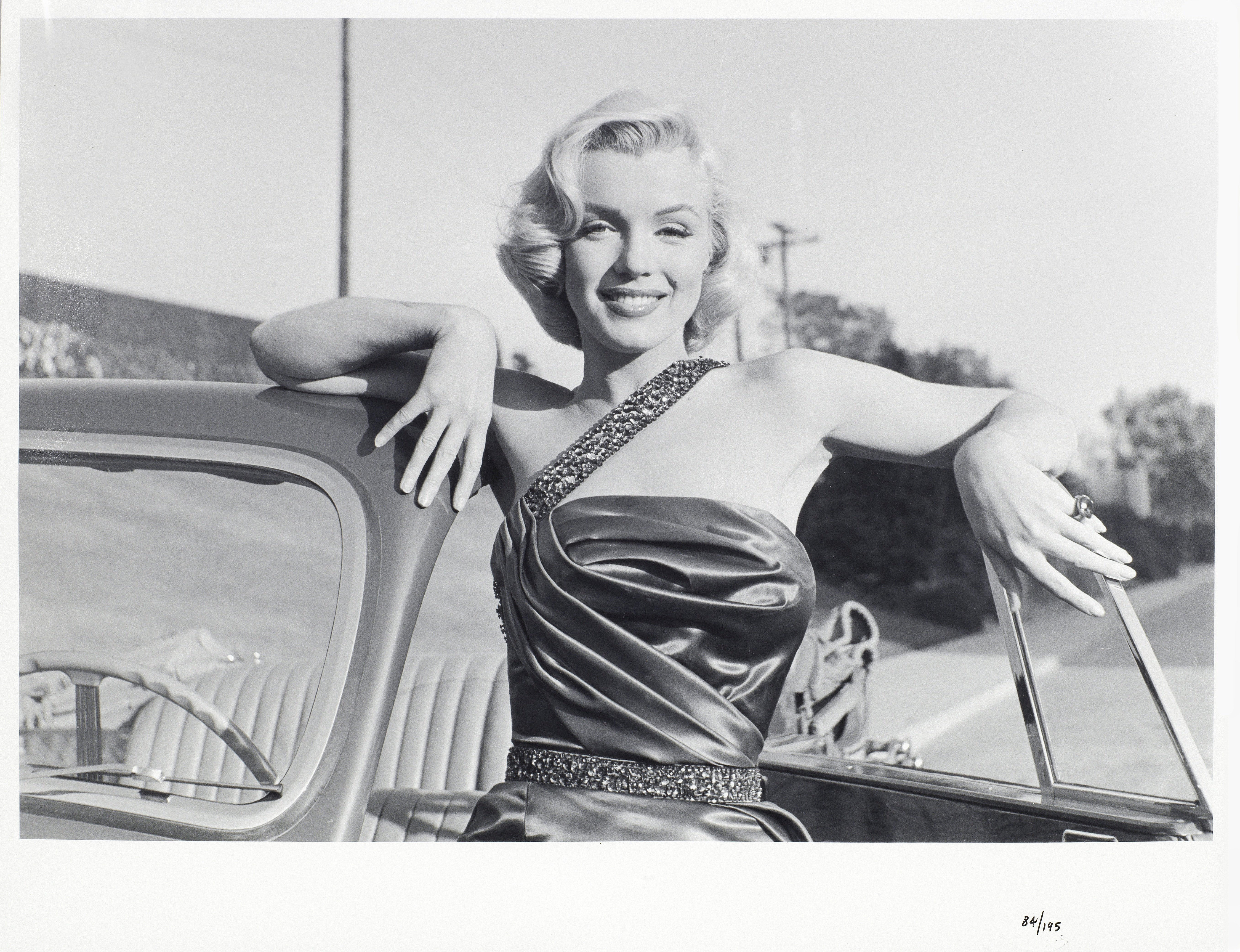 Frank Worth (American, b.1923-d.2000): A black and white photographic print of Marilyn Monroe, 19...