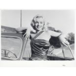 Frank Worth (American, b.1923-d.2000): A black and white photographic print of Marilyn Monroe, 19...