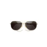Brad Pitt: a pair of Savile Row Eyewear aviator sunglasses worn by Brad Pitt for his role as 'Gle...