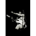 Linda McCartney (American, b.1941-d.1998): Jimi Hendrix playing guitar in New York, 1967, printed...