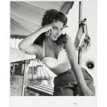 Frank Worth (American, b.1923-d.2000): A black and white photographic print of Elizabeth Taylor, ...