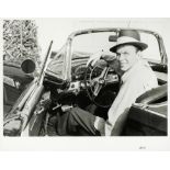 Frank Worth (American, b.1923-d.2000): A black and white photographic print of Frank Sinatra, 195...