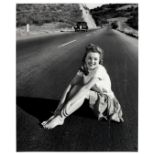 Andre de Dienes (Romanian/American, b.1913-d.1985): a silver gelatin print of a young Marilyn Mon...