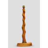 Alexandre Noll (1890-1970) Table Lamp circa 1950sycamore, with bronze collar at the base, carved ...