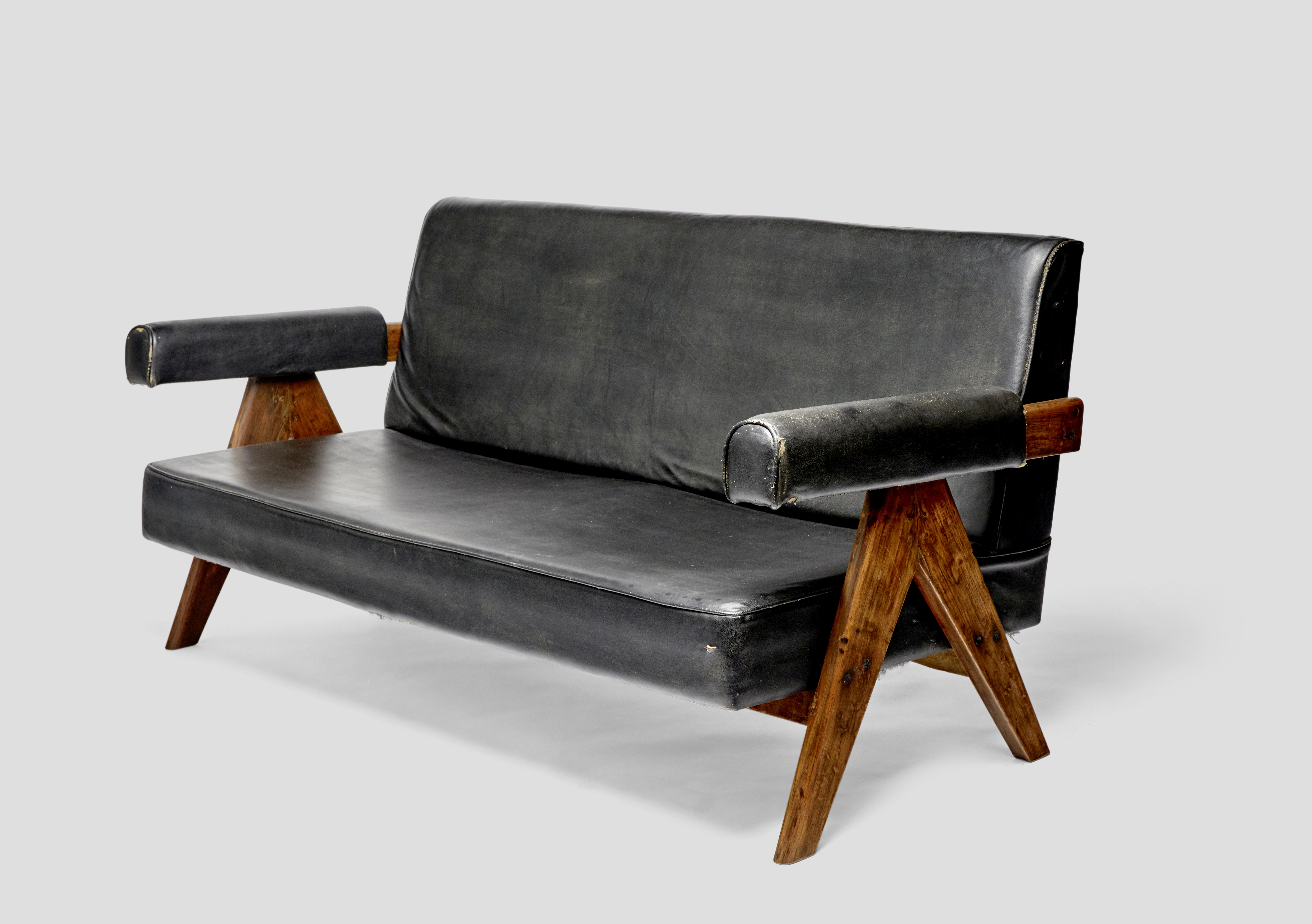 Pierre Jeanneret (1896-1967) Sofadesigned 1958teak, vinyl upholsteryheight 30 1/4in (77cm); width...