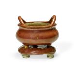 A red glazed earthenware censer and base Late Qing/Republic period (2)