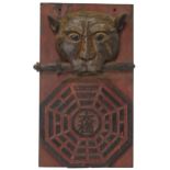 A polychrome painted wood tiger plaque 19th/20th century