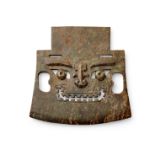 An archaistic taotie stone axe-head