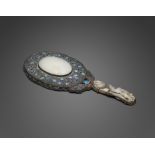 A jade-mounted hand mirror Qing dynasty elements