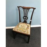 A Georgian Chippendale boardroom chair. Styled with tapestry topped cushion