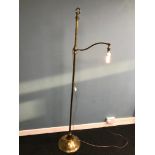 A Victorian Rise and fall converted standard lamp. Working. Measures 180cm in height.