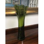 A large modern contemporary green glass vase. Measures 49cm in height.