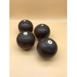 A Set of 4 Victorian wooden bowls by Thomas Taylor Glasgow. Miniature bowls. Measure 8.5cm in