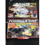 2 Scalextrics racing car sets (unchecked)