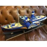 A Large model of a paddle steam boat. The boat is named Fantasia. Hand built, Highly detailed.