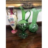 A rare example of a Victorian green glass wine jug/ Ewer. Together with hand painted Victorian