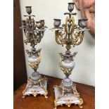 A Large pair of antique candelabras ornately designed with gilt metal work, granite centre body