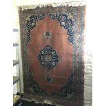 A large ornate living room rug