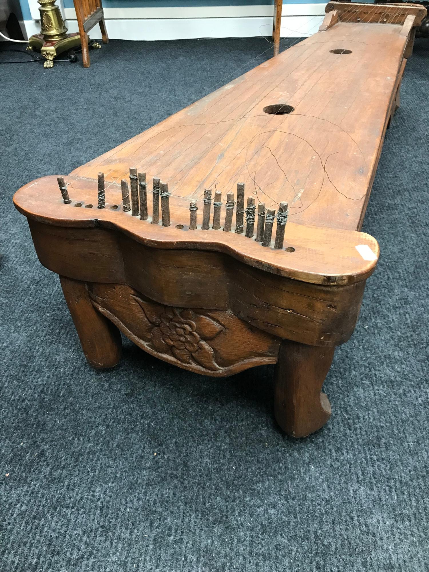 A Large 19th Century Malaysian hardwood Zither/ Guqin sit down instrument. Comes with wooden tone/ - Image 2 of 6
