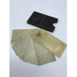 A Victorian ivory note pad and sleeve.