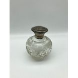 A London silver topped and cut crystal perfume bottle. Makers William Henry Sparrow. Dated 1921