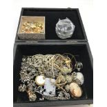 A Box of costume jewellery which includes fresh water pearl necklaces with 9ct & silver clasps.