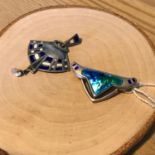 A Silver and enamel sting ray pendant by William Hair Haseler. Together with an Art Nouveau