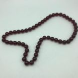 A cherry amber bead necklace