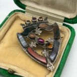 A Victorian Silver Luckenbooth brooch, set with agate, citrine and ruby stones.