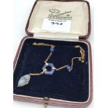 An Art Nouveau ladies 9ct gold dress necklace designed with an opal drop let stone & 3 Blue stones