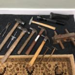 A Collection of vintage claw hammers & Torches