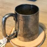 A Birmingham silver mug, Makers Robert Chandler. Dated 1912. Stands 7.5cm in height