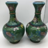 A Pair of large Chinese cloisonné flower design vases. Measure 26.5cm in height.