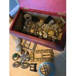 A Box containing vintage Art Deco & Art Nouveau belt buckles & Pendants. Includes various highly