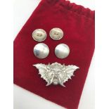 A lot of four Birmingham silver buttons together with an ornate devil brooch