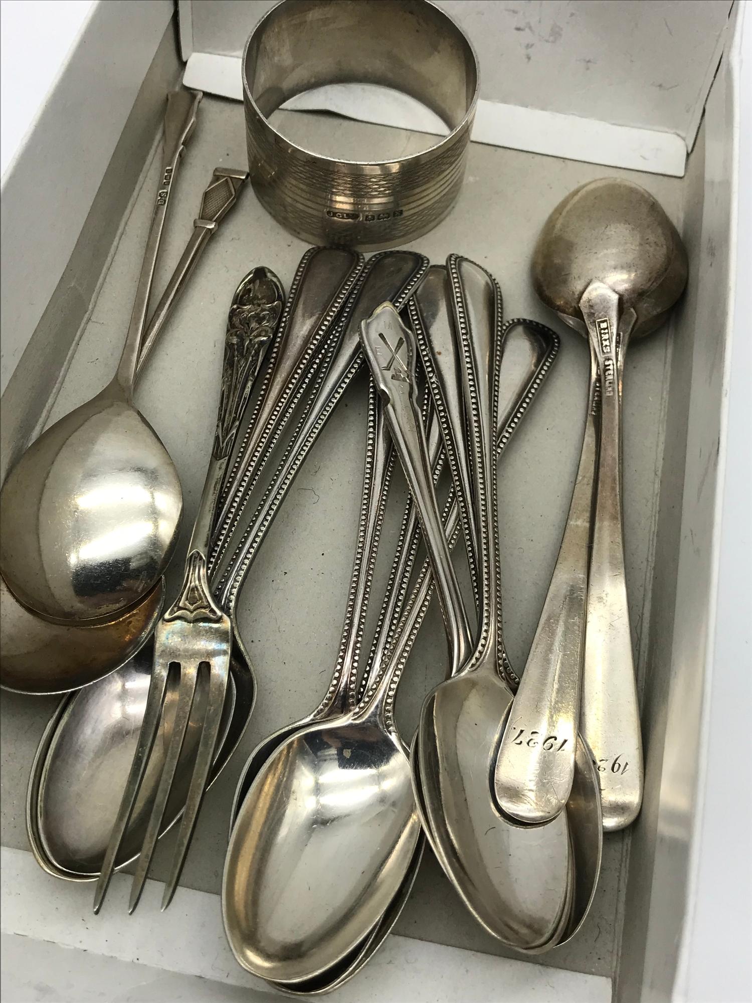 A Small box of EP tea spoons, Includes 3 Sterling silver tea spoons, 2 Birmingham silver tea