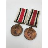 A WW2 Special Constabulary long service medal to John E. Mann. Together with Special Constabulary